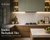 Modern modular kitchen featuring a stylish herringbone-pattern backsplash tile design, warm wooden cabinetry, light stone countertops, under-cabinet lighting, and contemporary decor elements. The kitchen showcases elegant backsplash tile ideas