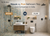 Mosaic vs. Plain bathroom tiles for a cost comparison in India. The left side features a vibrant Moroccan-style pattern, while the right showcases minimalist beige vitrified tiles with matte black fixtures.