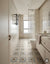 1626 Moroccan vitrified bathroom floor tile featuring intricate Moroccan-inspired geometric patterns and decorative rangoli-style printed detailing with a durable matt finish, designed to create an elegant and artistic flooring surface for contemporary and traditional interior spaces.