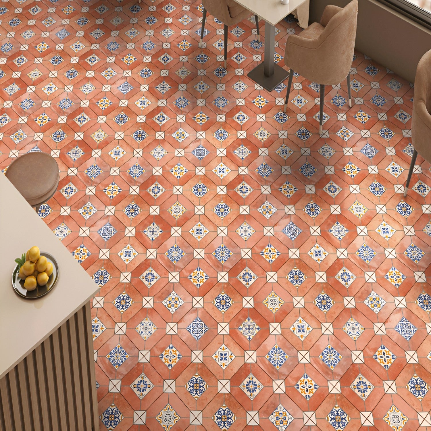 20040 Decor-2 Moroccan Vitrified Matt Tile 8x8 inch with terracotta red base, featuring colorful blue, white, and yellow traditional motifs, laid in a dining café setting.