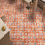 20040 Decor-2 Moroccan Vitrified Matt Tile 8x8 inch with terracotta red base, featuring colorful blue, white, and yellow traditional motifs, laid in a dining café setting.