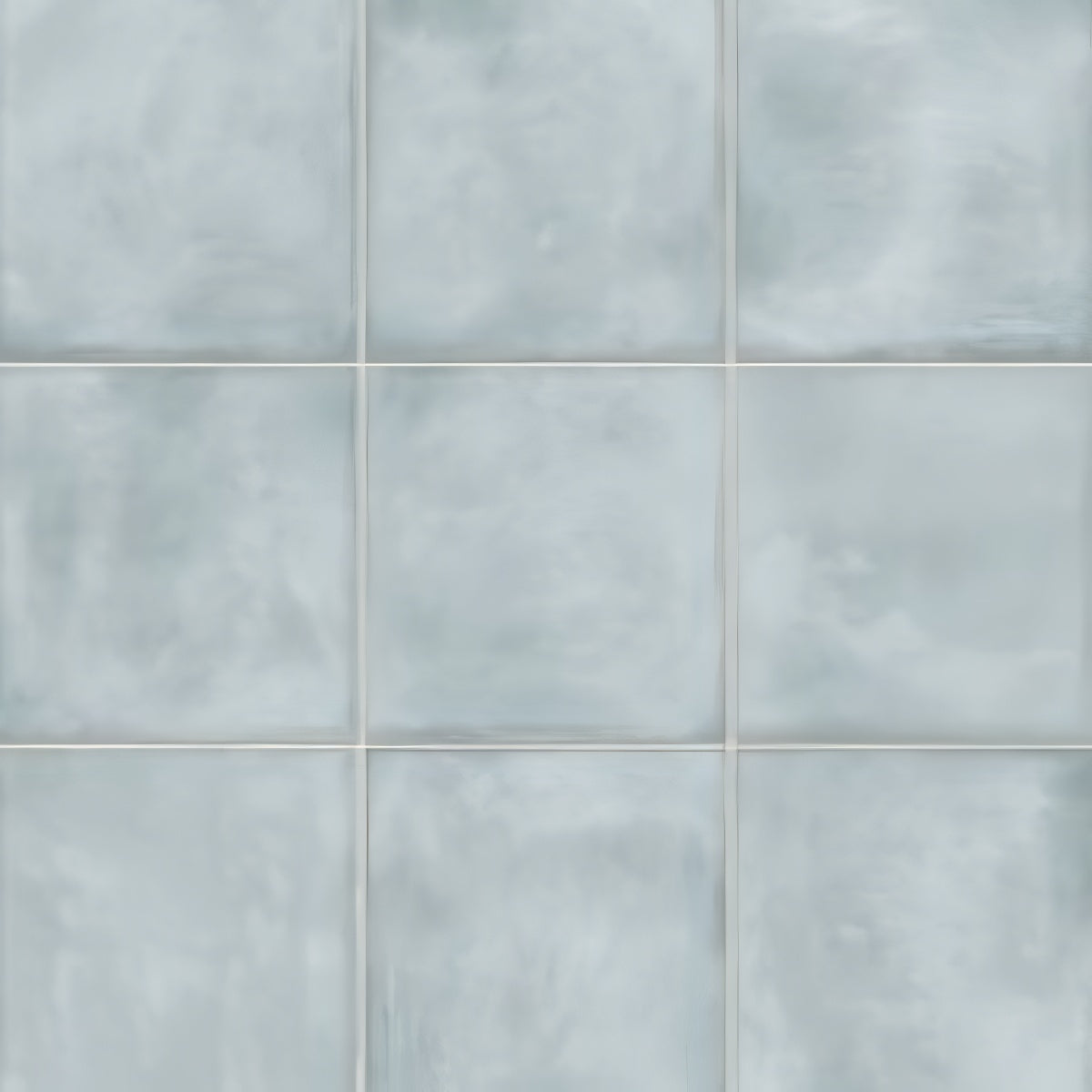 306 MN Tile 12x12 Inch – Sky blue matte ceramic tile with soft cloudy texture for calm and airy wall designs.

