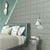 314 MN Tile 12x12 Inch – Aqua green matte wall tile with vertical ribbed texture for serene, modern interiors.

