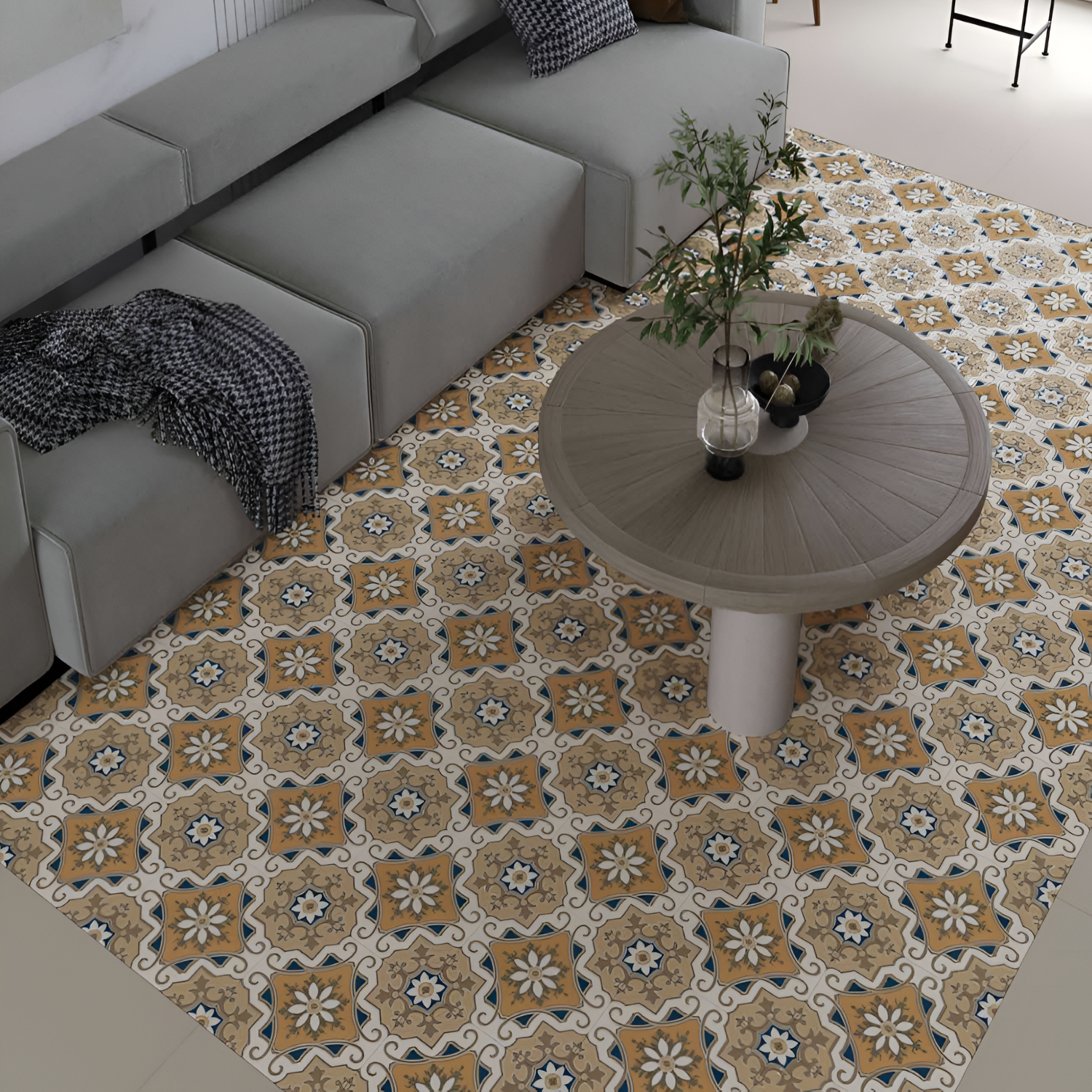 533 Decor Moroccan Vitrified Tile 12x12 inch featuring a bold central floral motif with petal shapes in white and beige, surrounded by intricate scrollwork and ornamental corners in rich blue and tan tones.