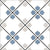 Floor layout of 534 Decor Moroccan Vitrified Tile 12x12 inch featuring blue, white, and beige tones with intricate geometric and floral motifs arranged in a repeating diamond pattern, creating a vibrant and traditional Moroccan look.
