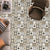 60030 Moroccan Tile – 24x24 inch ceramic tile featuring traditional Moroccan geometric and floral patterns in neutral beige and gray tones with a vintage finish.