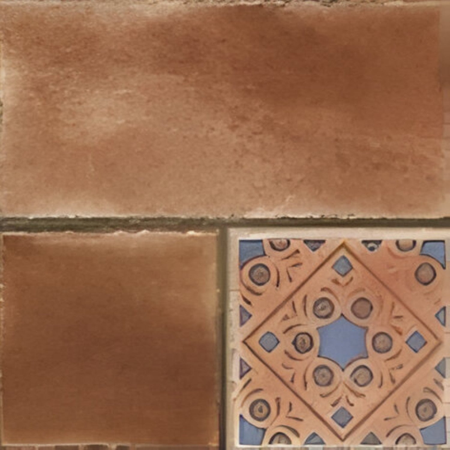 6004 Decor Vitrified Tile 20x20 Inch – Warm brown tile featuring a mix of plain and embossed floral patterns, perfect for rustic or Mediterranean-style spaces.
