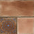 6004 Decor Vitrified Tile 20x20 Inch – Warm brown tile featuring a mix of plain and embossed floral patterns, perfect for rustic or Mediterranean-style spaces.