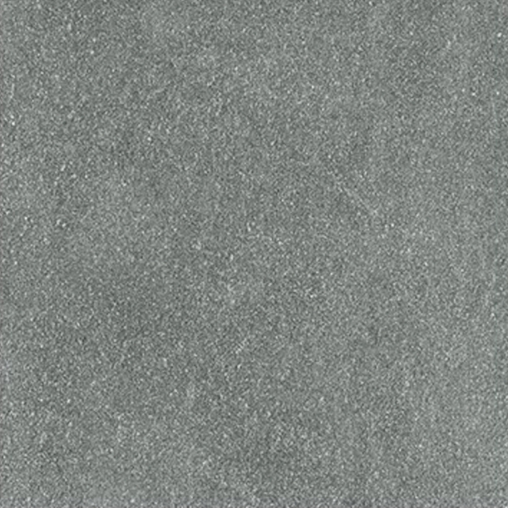 8073 Rustic vitrified floor tile with matt finish installed in a modern interior space, showcasing a natural textured surface pattern, precise square format layout, smooth edges, and a balanced rustic design that enhances the overall flooring aesthetics without high gloss reflection.