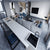 Premium quartz kitchen counter top slab with smooth polished gloss surface installed in a modern modular kitchen setting, featuring seamless finishing, luxurious reflective texture, durable engineered stone construction, spacious countertop design, and elegant contemporary interior styling suitable for residential and commercial spaces.