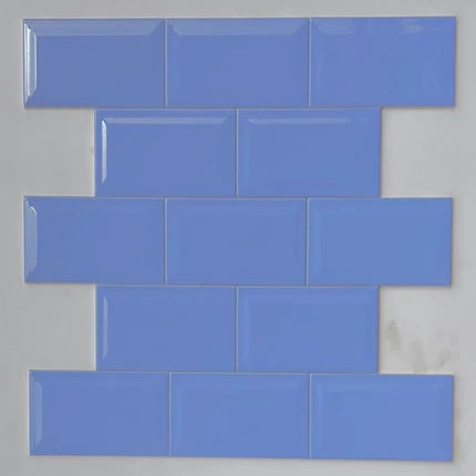 Al Blue Bevelled Subway Tile 4x8 inch with a glossy finish, featuring a soft aluminum-blue beveled surface, smooth and durable, ideal for modern backsplashes and decorative wall applications.
