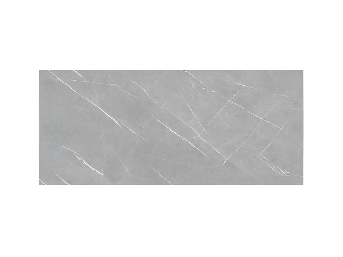 Arina Grey vitrified tile in 24x48 inch large format with a glossy marble-inspired surface, installed on both floor and wall, showing seamless alignment, smooth reflective finish, modern interior styling, and premium architectural look.