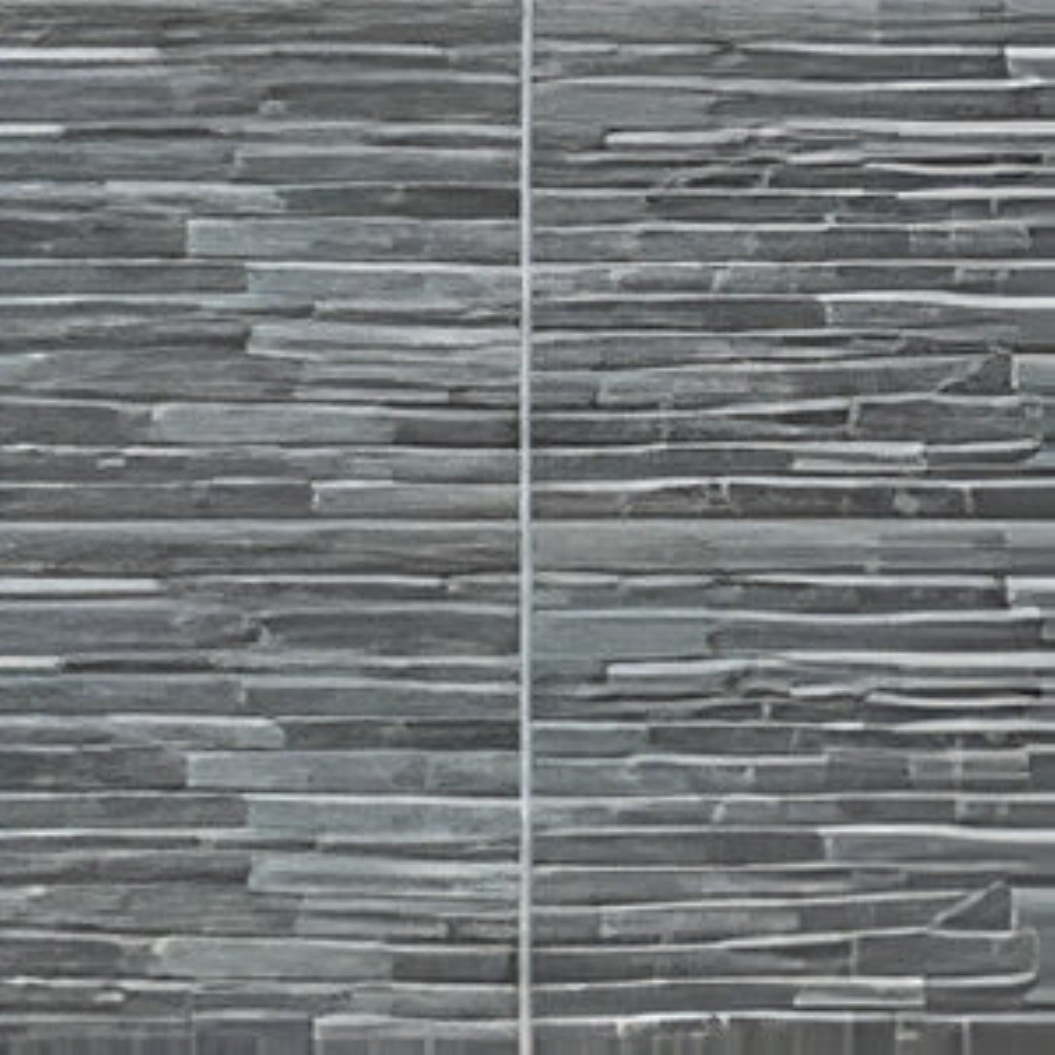 Arise Stone Slate Vitrified Tile 12x24 inch with a matt finish, featuring a natural slate-like texture in grey tones, durable and scratch-resistant surface, ideal for contemporary floors and walls.
