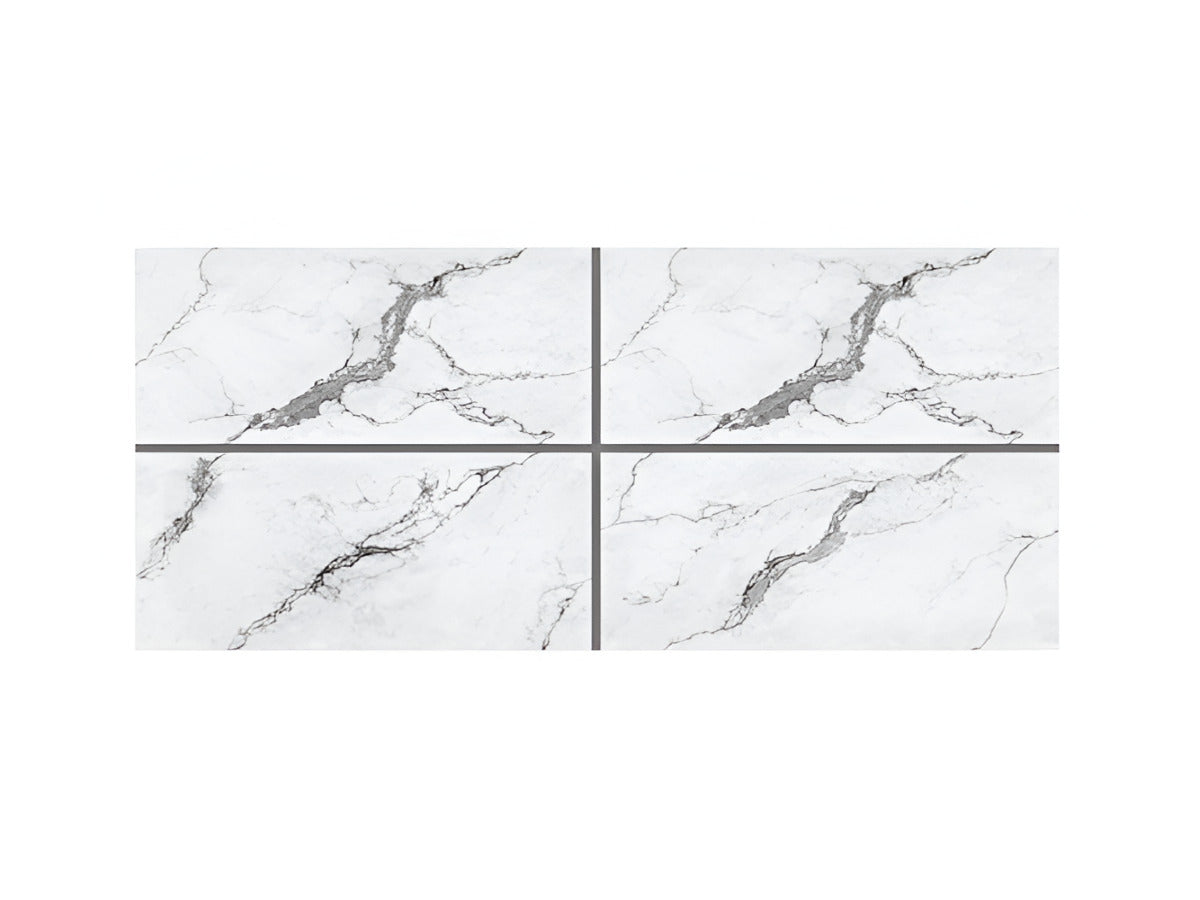 Avira Statuario GR vitrified tile installed on floor and wall, featuring a marble-inspired surface pattern with a glossy finish, large rectangular format, seamless layout, and elegant architectural styling in a modern indoor space.
