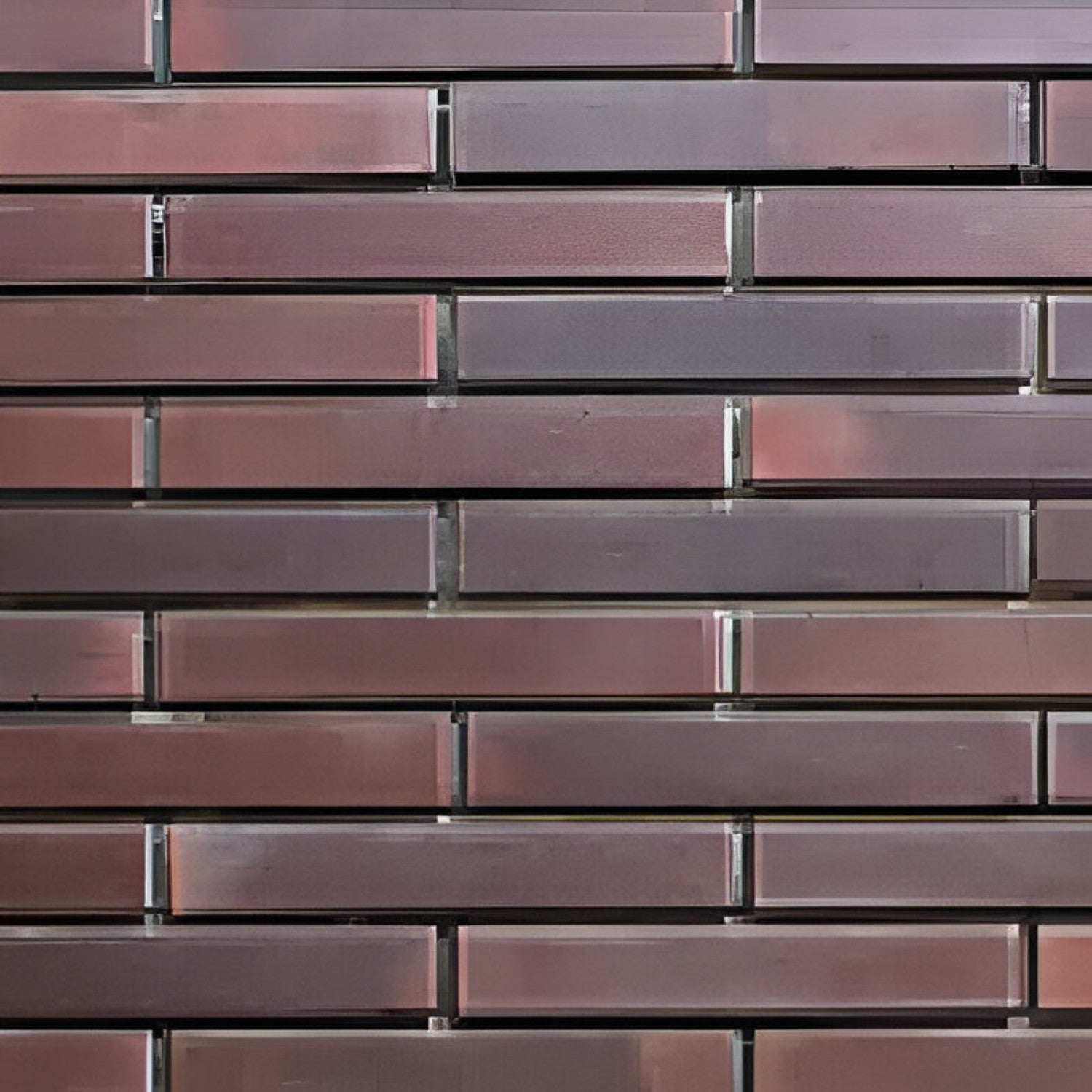 BT 915/902 Brick Tile in warm earthy brown tone, measuring 2 × 9 inches, with a natural clay texture that replicates traditional handmade brickwork. The image shows slim rectangular tiles arranged in a classic running bond pattern, ideal for rustic accent walls, kitchen backsplashes, or exterior cladding.