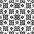 CT-018 Moroccan vitrified tile with a high-contrast black and white palette, featuring a symmetrical floral diamond pattern repeated across the surface for a bold, graphic effect.