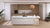 Calacatta Ornate quartz kitchen countertop slab with polished glossy finish installed in a modern kitchen interior featuring a seamless large-format surface suitable for countertops, islands, dining tables, and contemporary residential or commercial spaces.