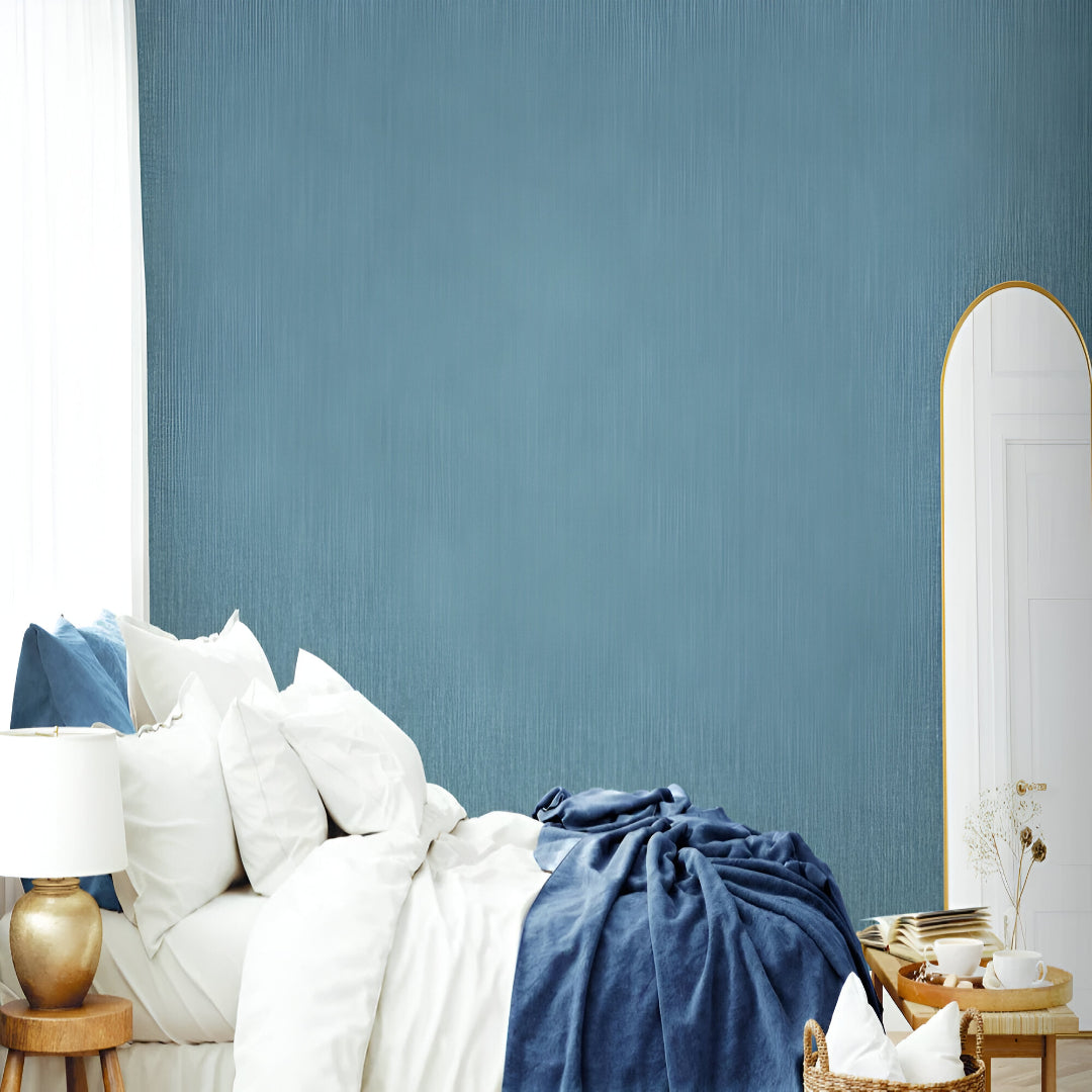 Chroma 74052-7 Blue Wallpaper showcasing a refined textured surface with subtle detailing in elegant blue tones, designed to add depth, sophistication, and a modern luxurious feel to interior walls, ideal for bedrooms, living rooms, or feature wall décor.