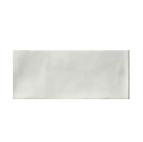 Cleo Pearl Glossy Subway Tile 3x12 inch with a glossy finish, featuring a soft pearl-white surface, smooth and durable, ideal for modern backsplashes and decorative wall applications.
