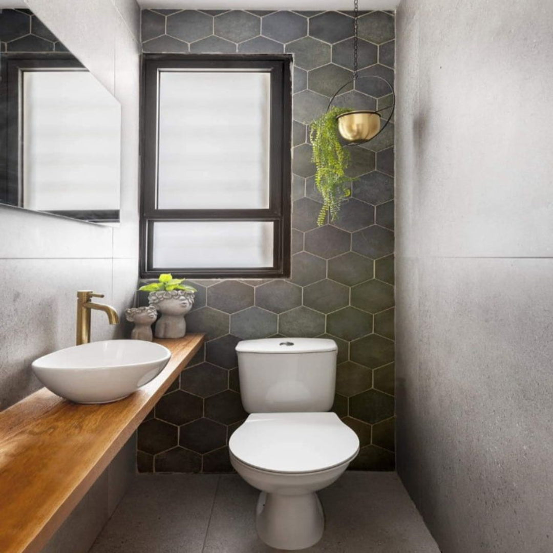 Hexagon tiles in grey color used as bathroom highlighter