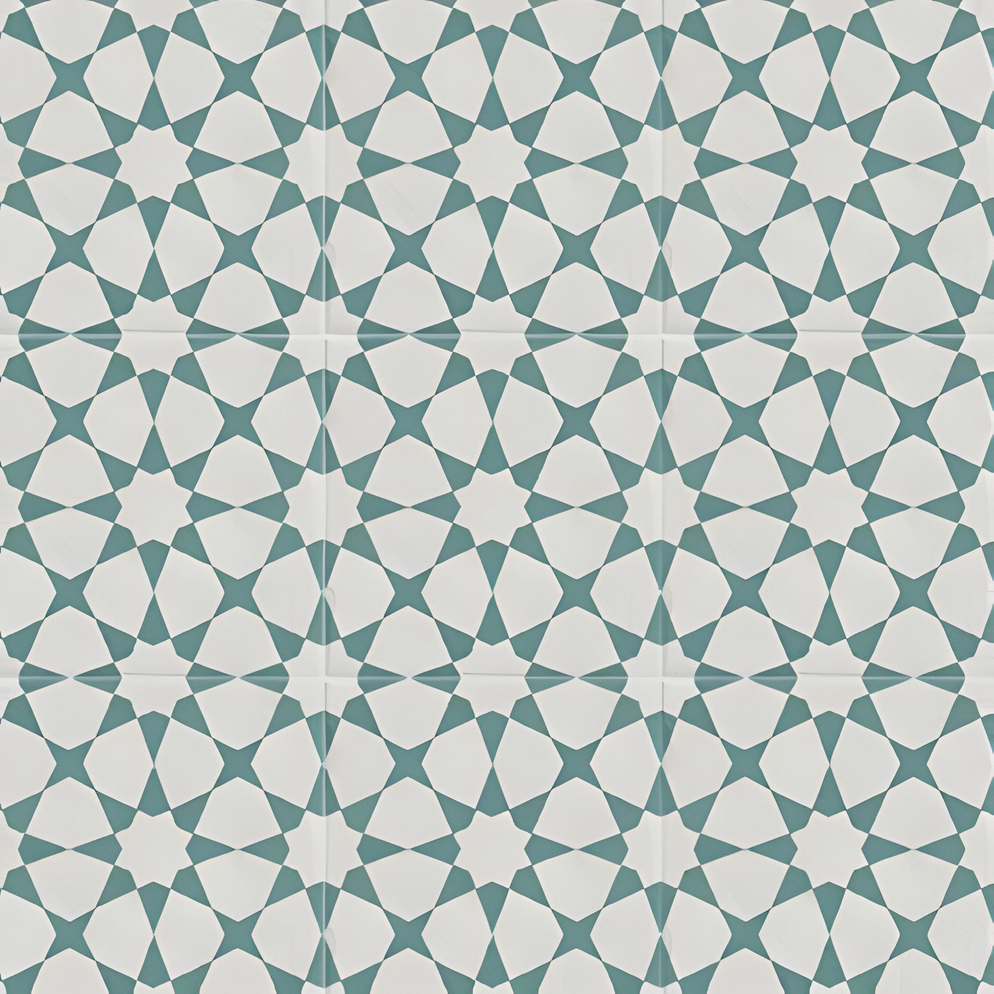 Ducati Mint Decor 1 Moroccan vitrified tile in mint color featuring intricate printed Rangoli-inspired Moroccan artwork with glossy finish, suitable for floor and wall applications in living rooms, kitchens, bathrooms, and decorative interior spaces.