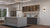 Dune Mist quartz kitchen counter top slab with premium gloss finish installed in a contemporary modular kitchen setting, featuring a seamless large-format quartz surface suitable for kitchen islands, counters, dining tables, and luxury interior applications with elegant polished texture and modern architectural styling.