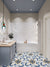 Homebliss Moroccan Vitrified Tile 16x16 Inch (B) featuring intricate Moroccan and rangoli-inspired printed patterns on a durable vitrified surface with matt finish, installed as decorative bathroom flooring that adds artistic detail, texture, and elegant visual appeal to residential interior spaces.