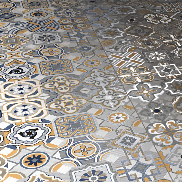 Colorful patchwork Kolam Multi Moroccan Matt 24x24 Inch floor tile featuring blue, mustard, grey, and white geometric and floral designs.