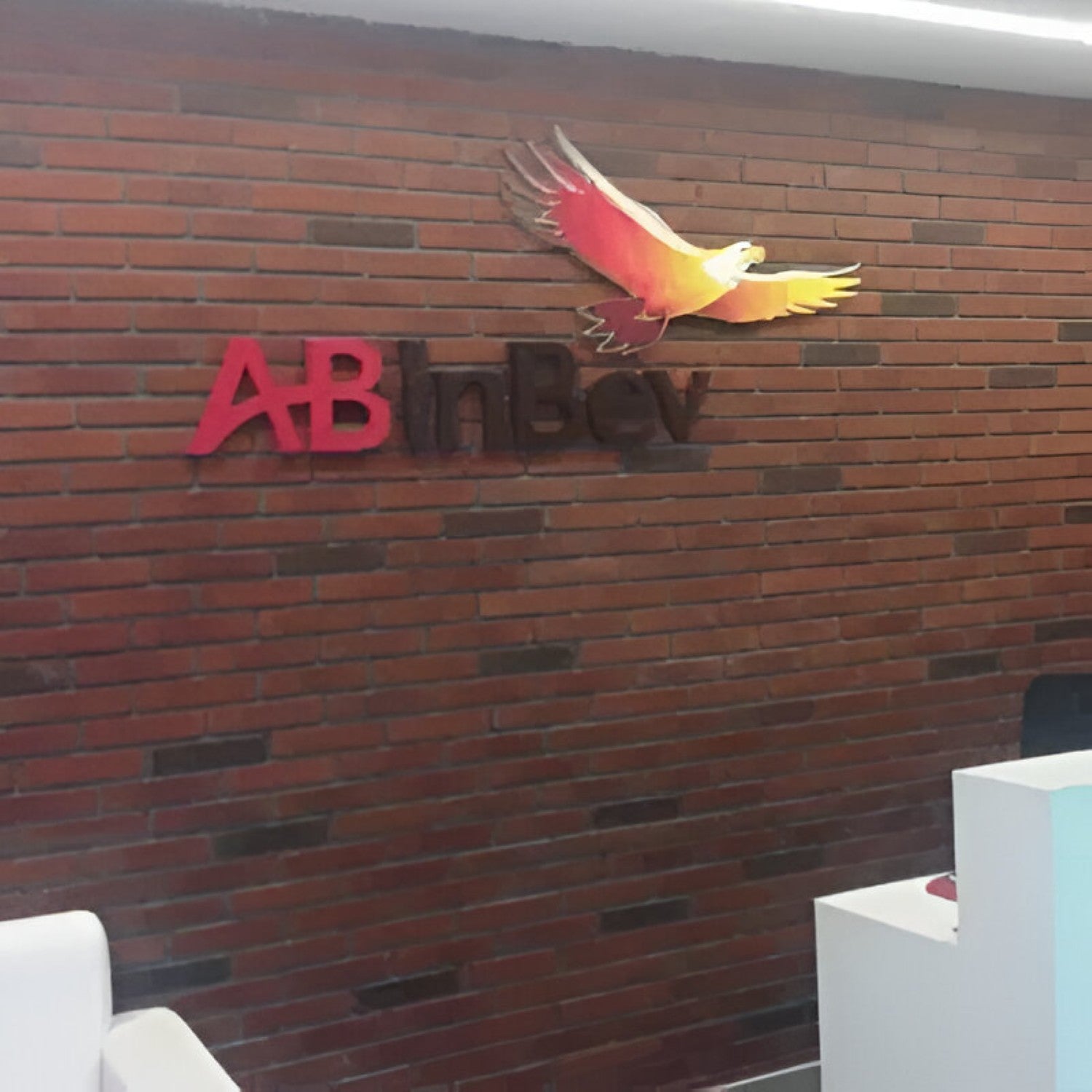 LB 915/902 Brick Tile, 2 × 9 inches, in natural brown clay finish with a textured surface that imitates real brick. The tiles are arranged in a classic staggered brick pattern, ideal for accent walls, interior feature walls, or rustic-style décor