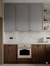 Lucido Base Bianco Vitrified Gloss Vitrified Tile in 8 x 8 inch size featuring a smooth glossy surface and plain solid design, installed in a modern kitchen interior on walls and floors, showcasing a clean, seamless appearance with reflective finish, durable vitrified construction, and contemporary subway-inspired styling suitable for residential and commercial spaces.