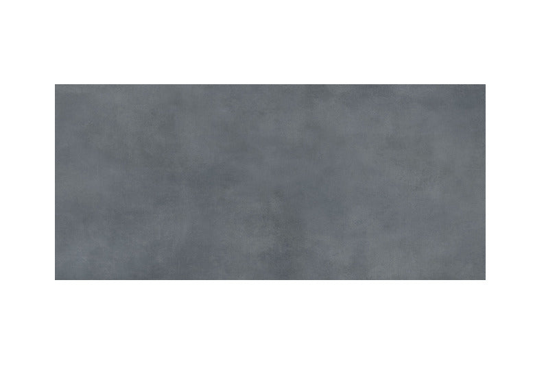 Luna Slate vitrified tile in 24x48 inch format with a plain rustic surface design, matt carving finish, and seamless large slab layout used on interior floor and wall spaces, showcasing textured detailing and modern architectural styling.