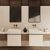 Lustre Cream quartz kitchen countertop slab with polished gloss finish installed in a modern modular kitchen setting featuring a seamless engineered quartz surface designed for premium kitchen counters, dining table tops, and contemporary interior applications with elegant texture detailing and large slab dimensions.