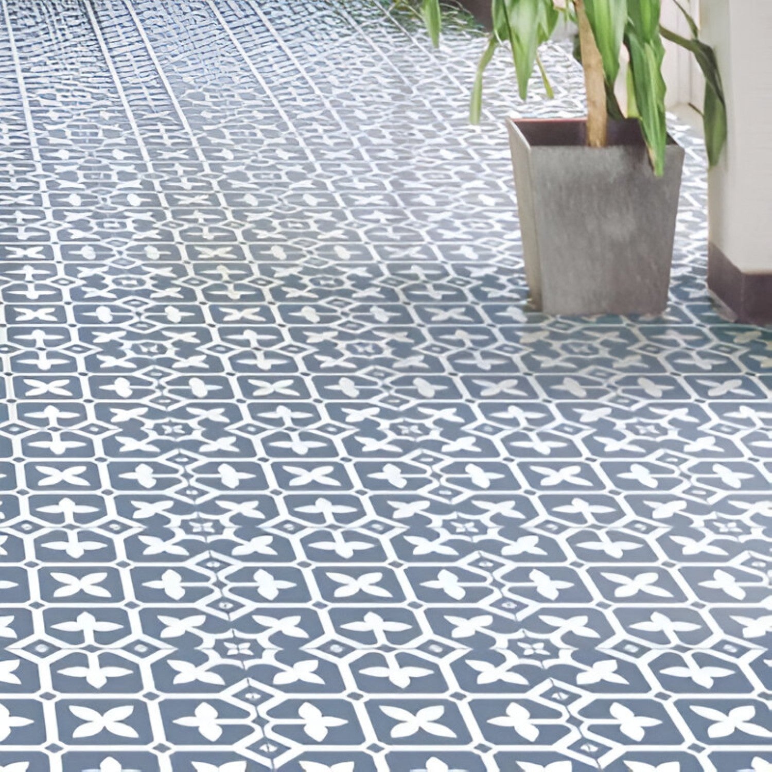 M‑10124 Ceramic Moroccan Tile – 12×12 inch matte ceramic tile in serene blue, featuring a continuous white floral and rangoli-style pattern for an elegant Moroccan-inspired design.