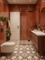 Marie Moroccan vitrified bathroom floor tile in 16×16 inch size featuring an intricate Moroccan and rangoli-inspired printed pattern with a matt finish, suitable for residential bathroom flooring, offering durable vitrified construction, decorative geometric detailing, low-maintenance surface, and elegant traditional-inspired craftsmanship for modern interiors.