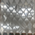 Mosaic XP-63 Tile 12x12 Inch – Brushed silver aluminum mosaic in teardrop wave pattern, modern metal finish for bold interiors.

