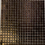 Mosaic XP-65 Tile 12x12 Inch – Micro square mirrored mosaic in deep bronze and gold tones with beveled glass finish.

