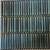 Mosaic XP-67 Tile 12x12 Inch – Iridescent glass tile in blue, teal, and green vertical bars for contemporary interiors.

