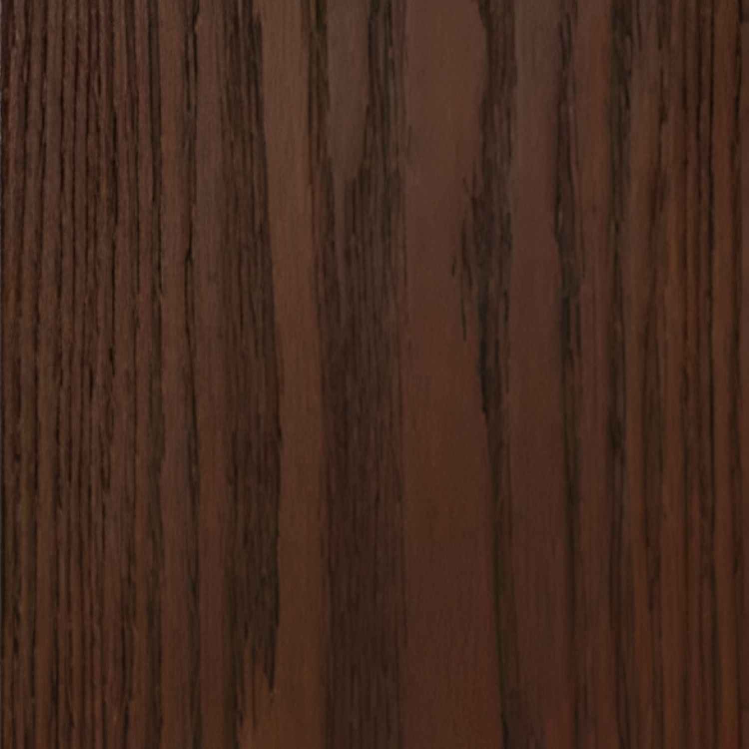 Oak Dark Carbonised Engineered Flooring 7x75 Inch, showcasing deep rich wood tones with pronounced grain patterns and a durable, smooth finish for elegant interiors.
