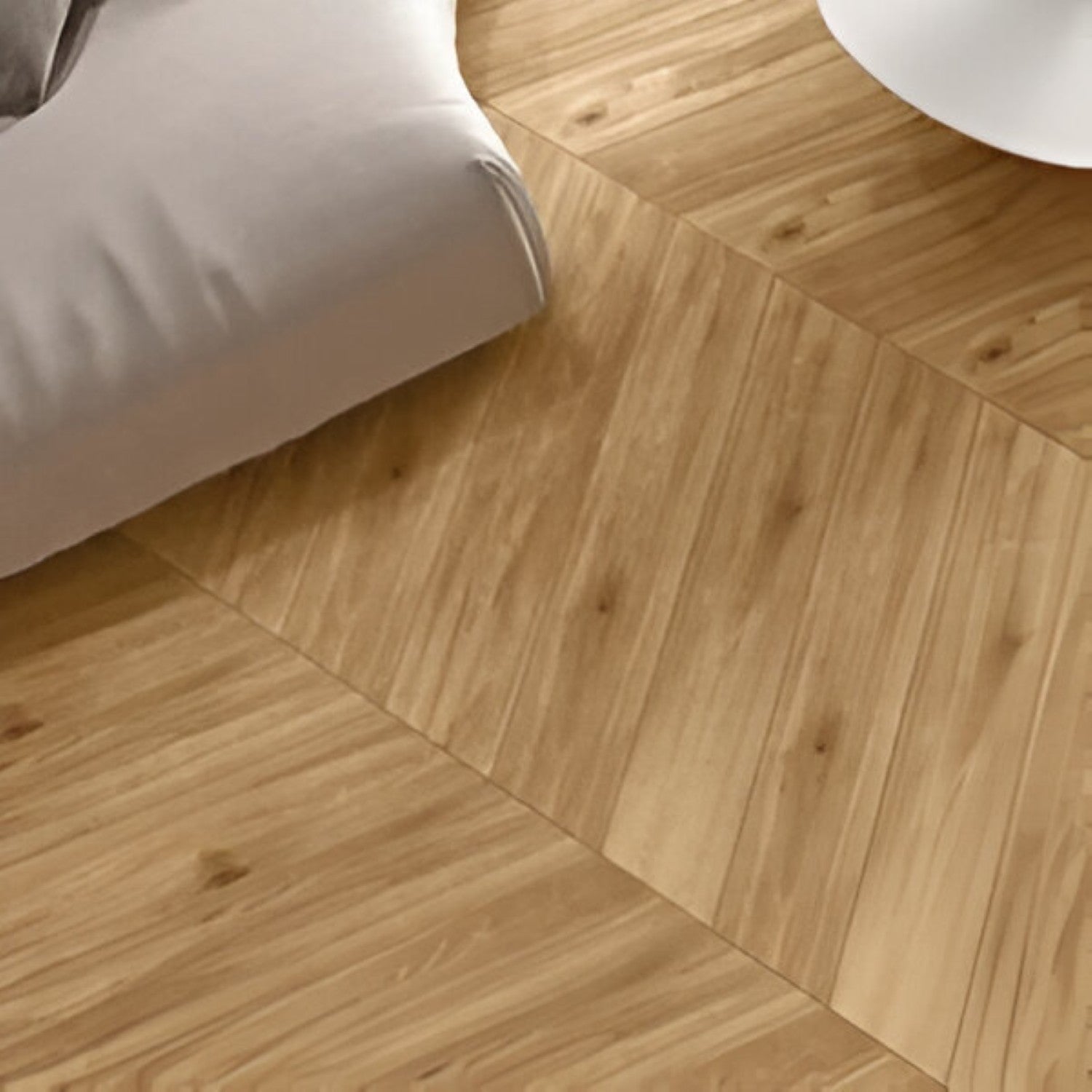 Oaklore Beige Chevron Wooden Tile 6x36 Inch, featuring soft beige oak tones arranged in a chevron pattern, ideal for warm, elegant, and durable flooring or wall applications.
