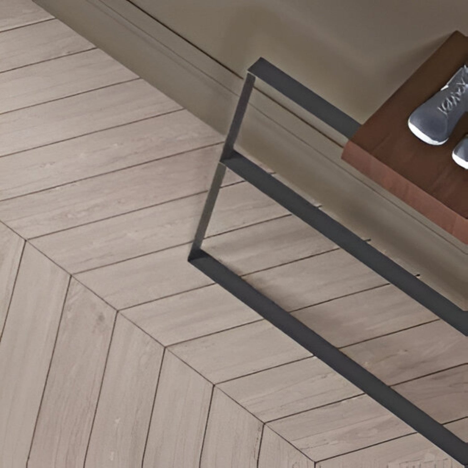 Oaklore Cemento Chevron Wooden Tile 6x36 Inch, featuring soft grey oak tones arranged in a chevron pattern, perfect for modern and durable flooring or wall applications.
