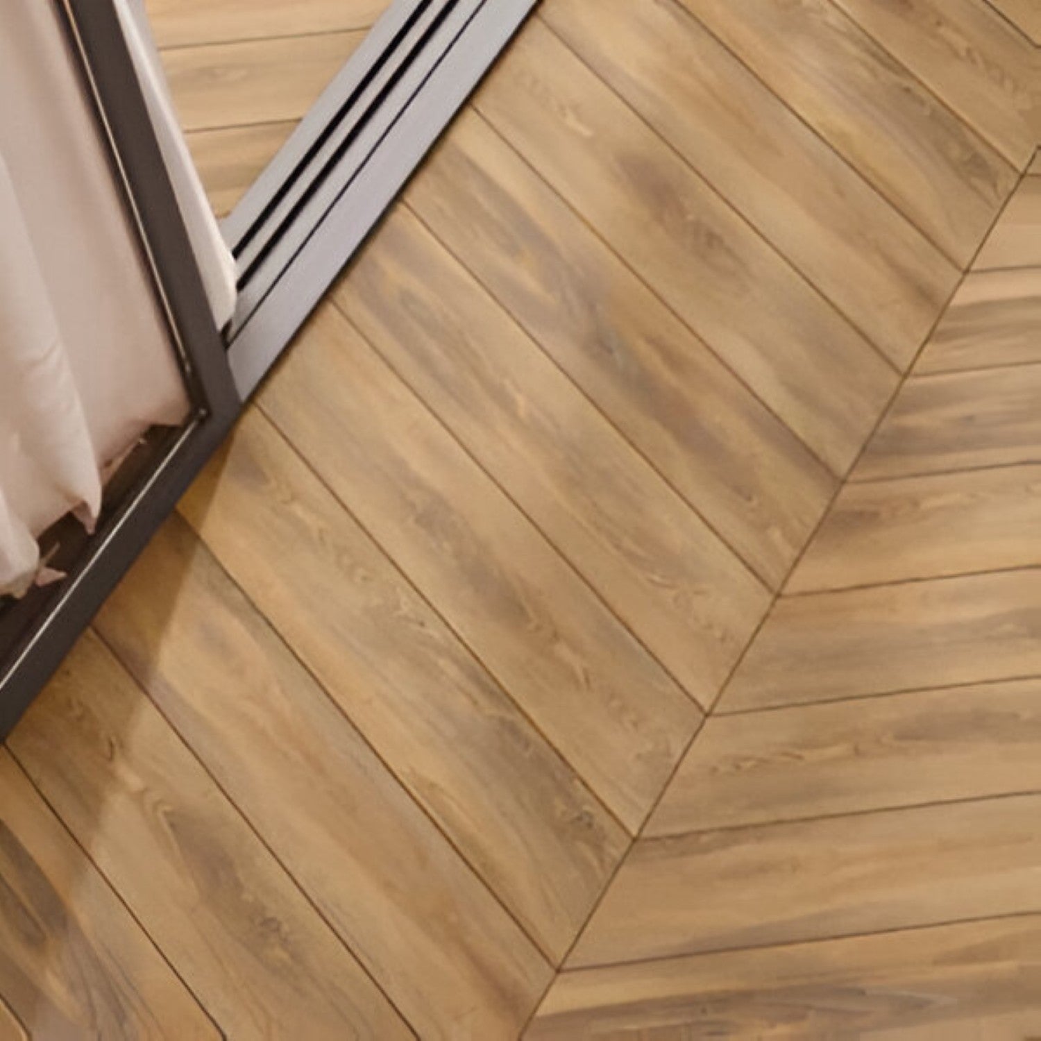 Oaklore Taupe Chevron Wooden Tile 6x36 Inch, featuring warm taupe oak tones arranged in a chevron pattern, ideal for elegant and durable flooring or wall applications.

