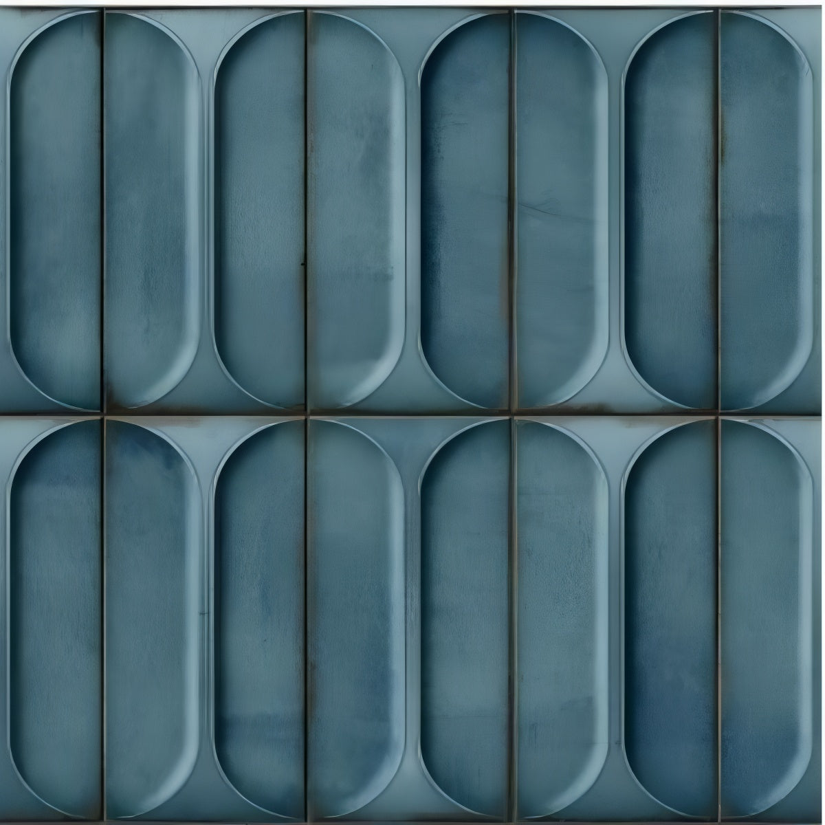 Opal Cosmo Pine Tile - 12x12 ceramic wall tile with glossy pine green glaze and raised capsule texture

