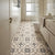 Pirna Moroccan Vitrified Tile 16×16 Inch (B) featuring an intricate printed Moroccan and Rangoli-inspired geometric pattern with a matt finish. Durable vitrified bathroom floor tile designed for moisture-prone spaces, offering elegant decorative flooring, long-lasting performance, stain resistance, scratch resistance, and a sophisticated traditional-meets-modern aesthetic suitable for residential interiors.