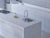 Premium Calacatta Colorado quartz kitchen countertop slab with polished gloss finish installed in a modern modular kitchen interior featuring smooth engineered quartz surface suitable for countertops, island counters, dining table tops, and luxury residential or commercial spaces.