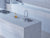 Premium White Vortex quartz kitchen countertop slab with polished gloss finish installed in a modern luxury kitchen interior featuring seamless surface detailing, contemporary countertop styling, elegant stone texture appearance, and large-format quartz tabletop application for residential and commercial spaces.