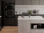 Premium quartz kitchen countertop slab with polished glossy surface installed in a modern modular kitchen setting featuring seamless edge detailing, spacious counter layout, refined engineered stone texture, and elegant contemporary interior styling suitable for residential and commercial spaces.