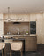 Sahara Swirl quartz kitchen countertop slab with polished gloss surface installed in a modern kitchen interior featuring seamless large-format quartz application suitable for counter tops, island counters, dining tables, and premium table top designs with elegant flowing surface texture and luxurious contemporary finish.