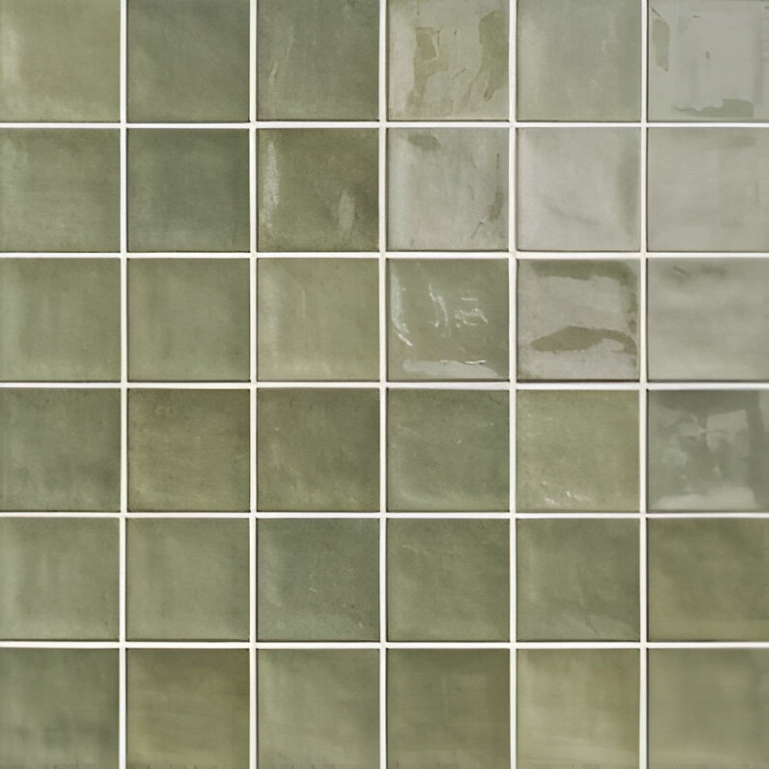 Segovia Forest Ceramic Tile – 8×8 inch glossy ceramic tile in deep forest green, showcasing handcrafted tonal variations typical of the Segovia range, ideal for accent walls and vibrant interior spaces.