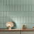 Silken Pistachio Subway Matt Tile 3x12 Inch ceramic wall tile in soft green shade, arranged in a classic subway layout, highlighting its smooth matt finish and ideal for kitchen and bathroom wall applications.