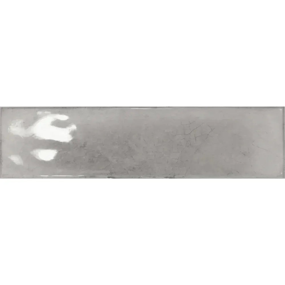 Splendor Grigio Subway Tile – 3×12 inch glossy ceramic subway tile in a soft grey tone with clean edges and a smooth, reflective surface, ideal for classic and contemporary kitchen backsplashes or bathroom walls.